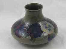 Appraisal: A Moorcroft vase with tube line Pansy decoration signed on