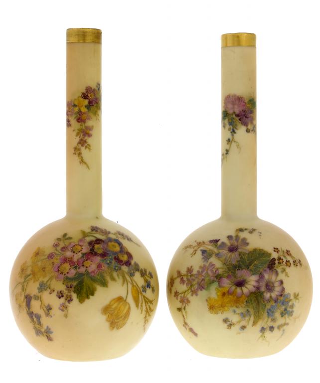 Appraisal: A PAIR OF ROYAL WORCESTER DRUMSTICK VASES decorated with wild