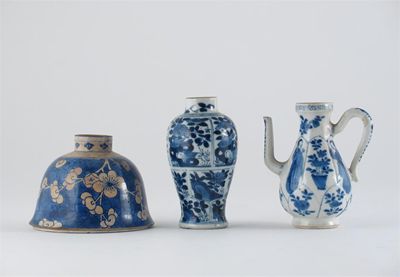 Appraisal: A Chinese blue and white miniature ewer decorated with lang