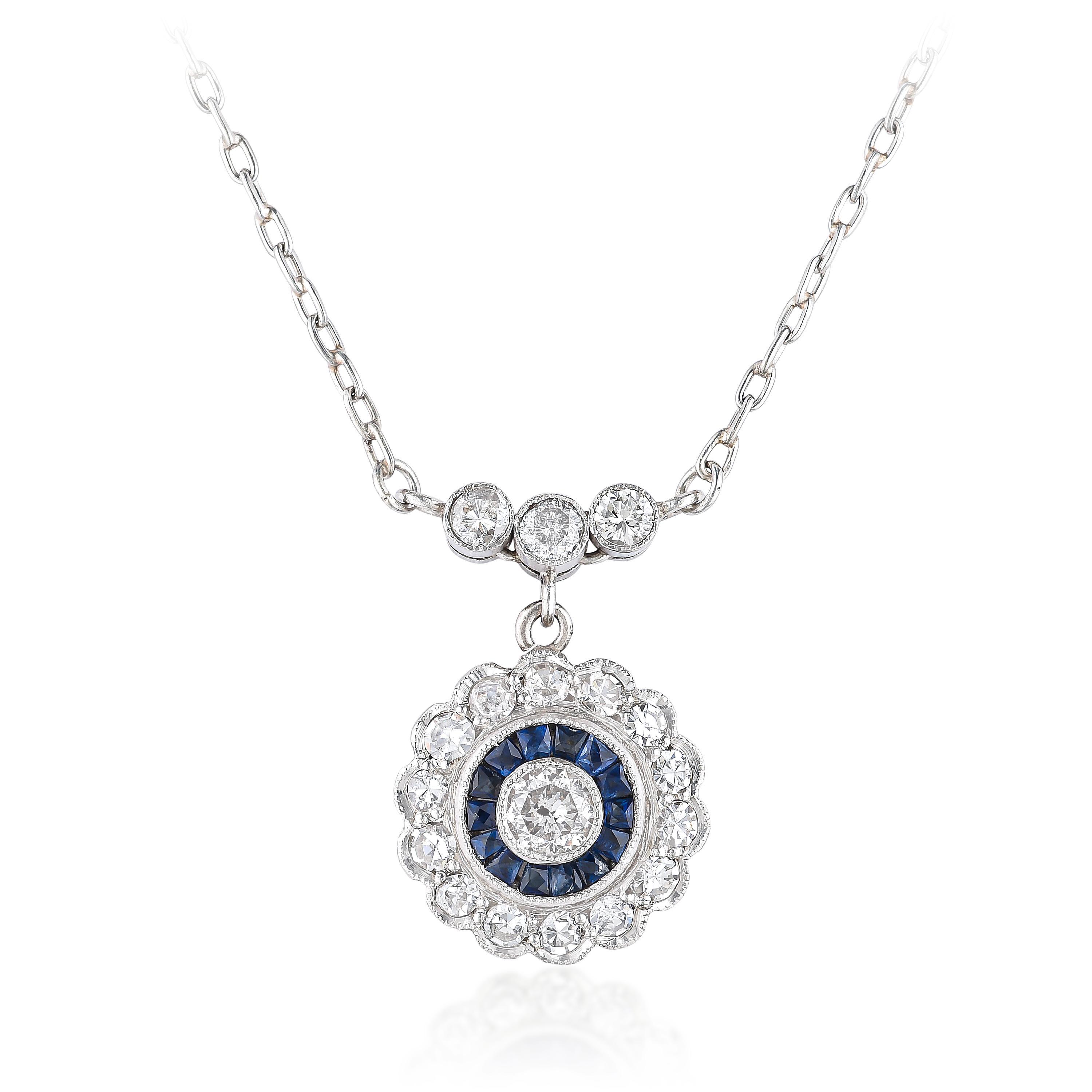 Appraisal: DIAMOND AND SAPPHIRE FLOWER PENDANT NECKLACE METAL K white gold