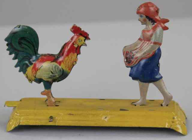 Appraisal: MEIER GIRL FEEDING CHICKEN PENNY TOY Germany lithographed tin articulated