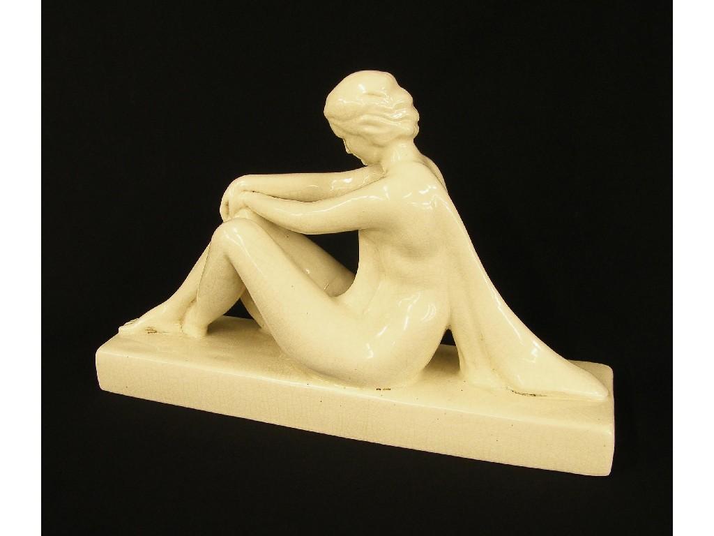 Appraisal: French Emaux de Longwy white glazed pottery figure of a