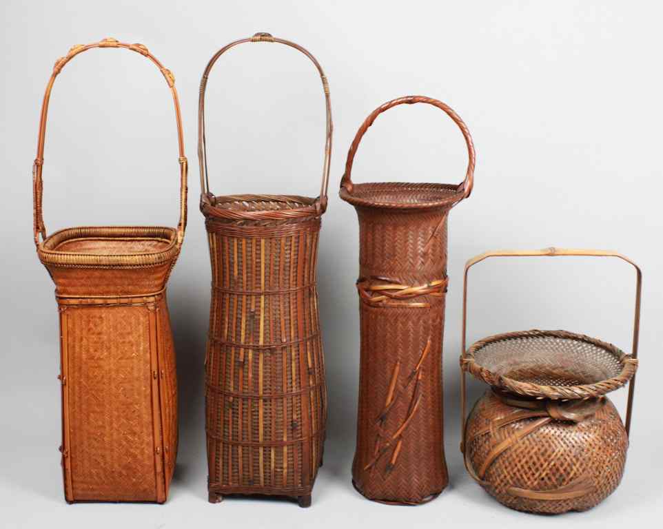 Appraisal: FOUR JAPANESE WOVEN FLOWER ARRANGING BASKETS three of tall narrow