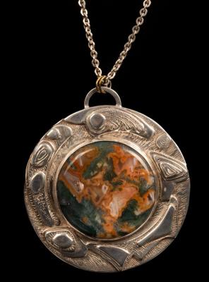 Appraisal: A silver and moss agate pendant by Helen Newman Birmingham