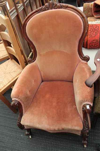 Appraisal: A VICTORIAN MAHOGANY FRAMED ARMCHAIR the carved cresting rail with