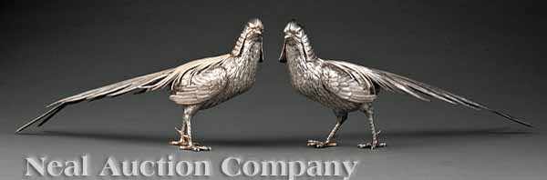 Appraisal: A Pair of Continental Silver Pheasants hallmarked intricately worked feathered