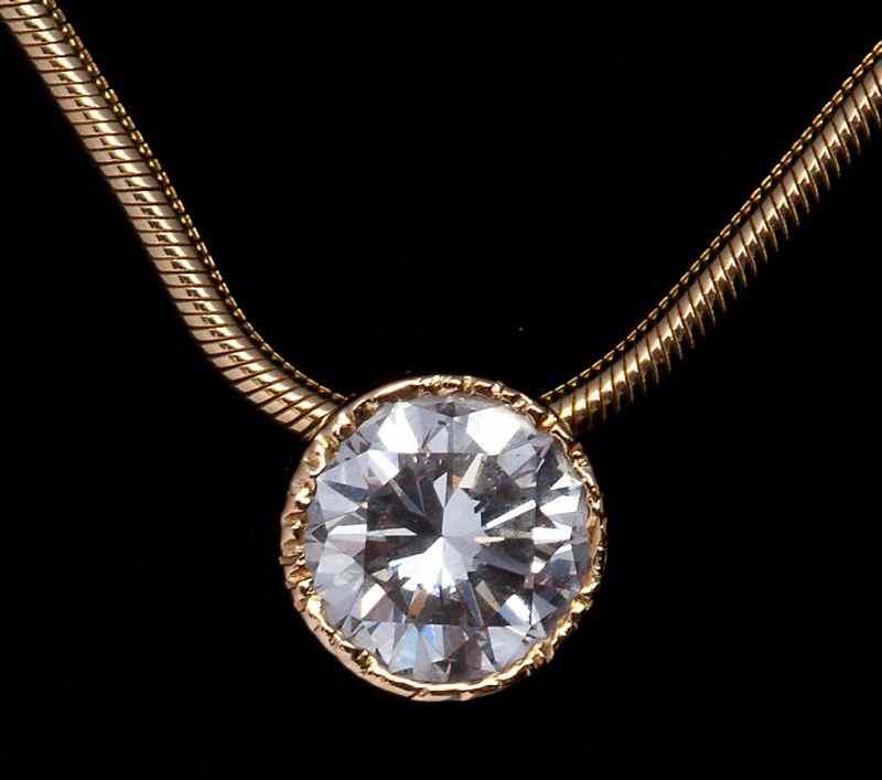 Appraisal: Diamond Slide Pendant Necklacefeaturing one round brilliant cut diamond x