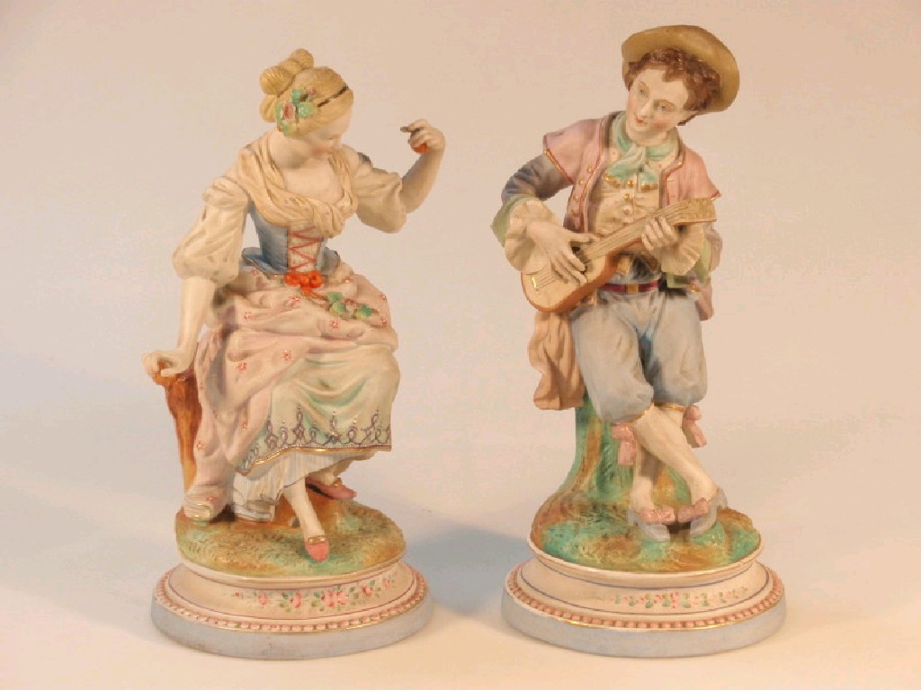 Appraisal: A pair of thC French bisque figures in thC dress