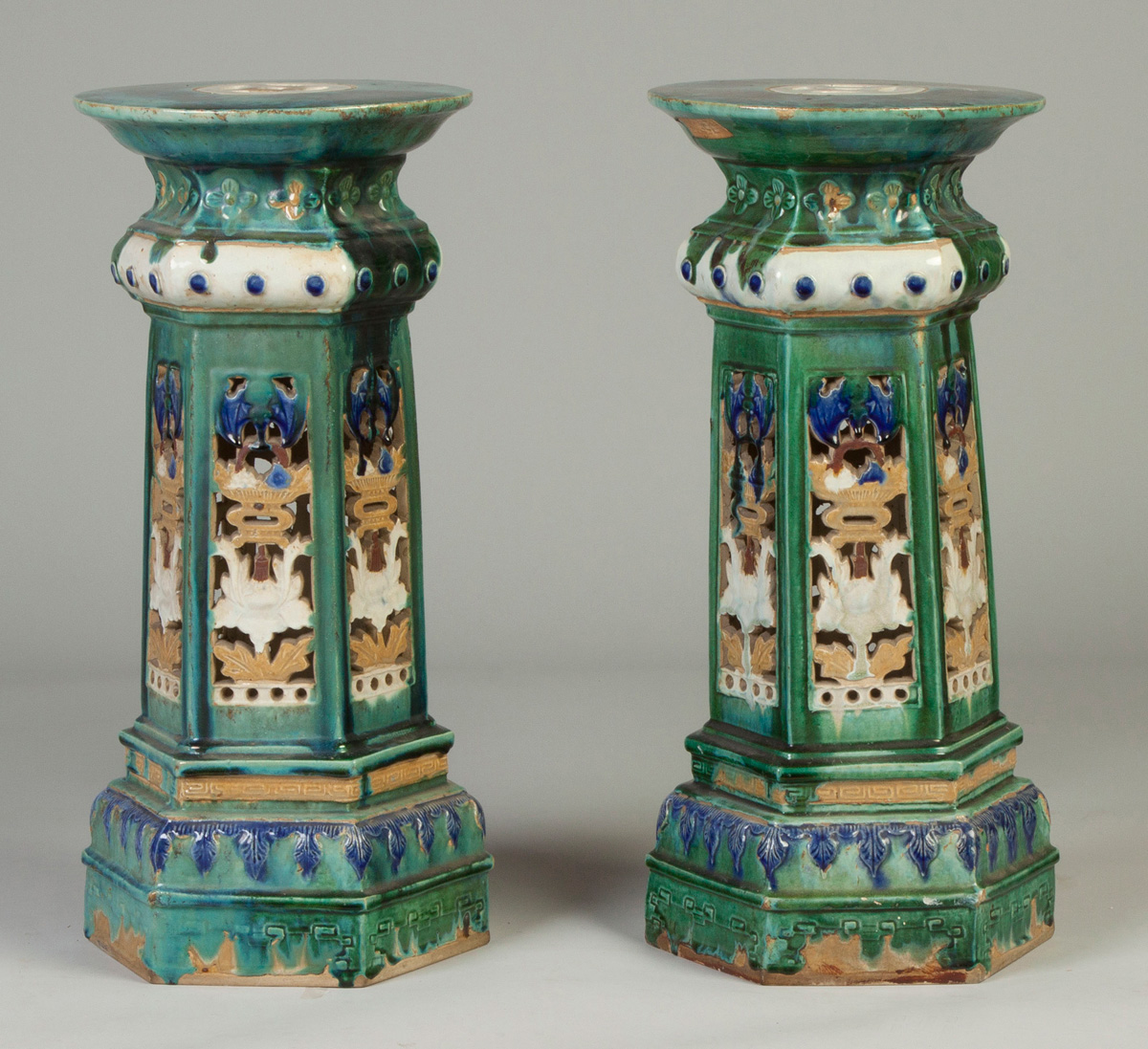 Appraisal: Pair of Glazed Pottery Pagoda Form Pedestals Reticulated work