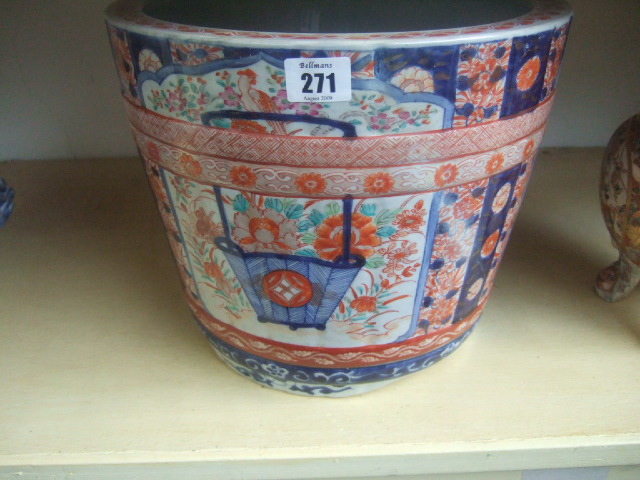 Appraisal: A Chinese jardiniere decorated in an imari pattern a f