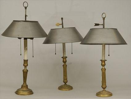 Appraisal: Three Empire Gilt-Metal Candlesticks Mounted as Lamps