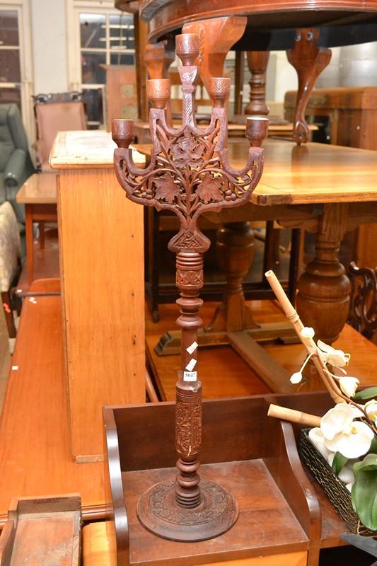 Appraisal: A HAND CARVED FIVE BRANCH WOODEN CANDELABRA A HAND CARVED