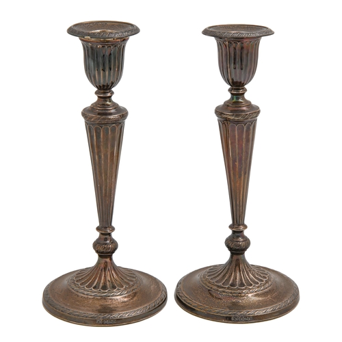 Appraisal: A pair of George V silver candlesticks in neo classical