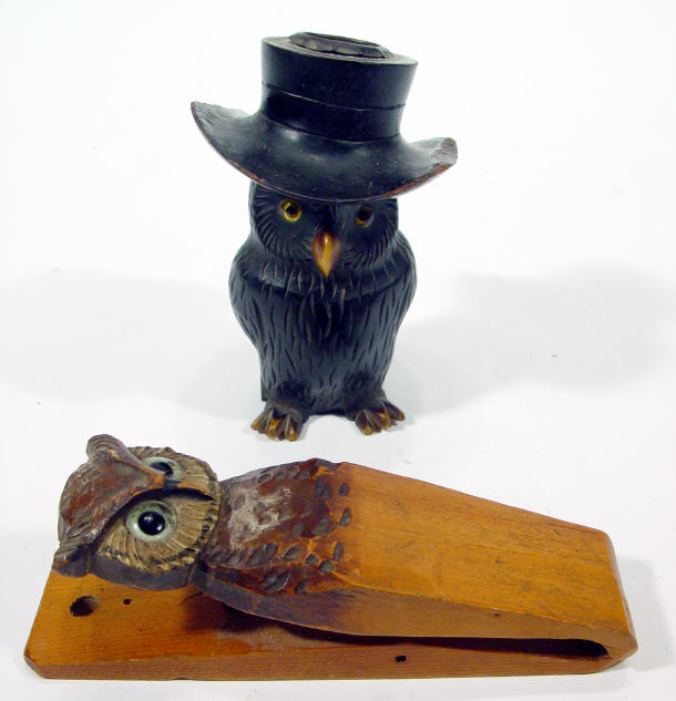 Appraisal: Ebonised owl spill vase with glass beaded eyes together with