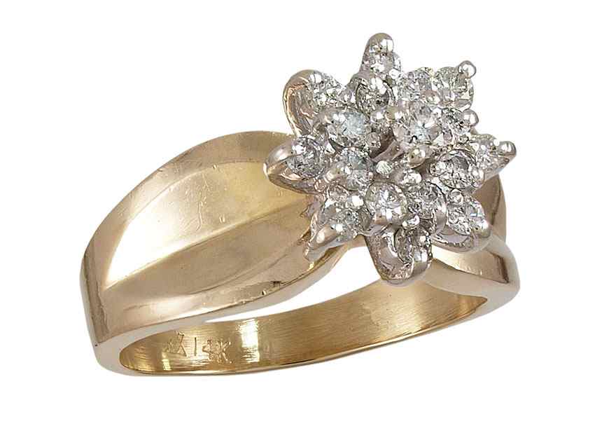 Appraisal: K DIAMOND STARBURST RING K yellow gold ring contains round