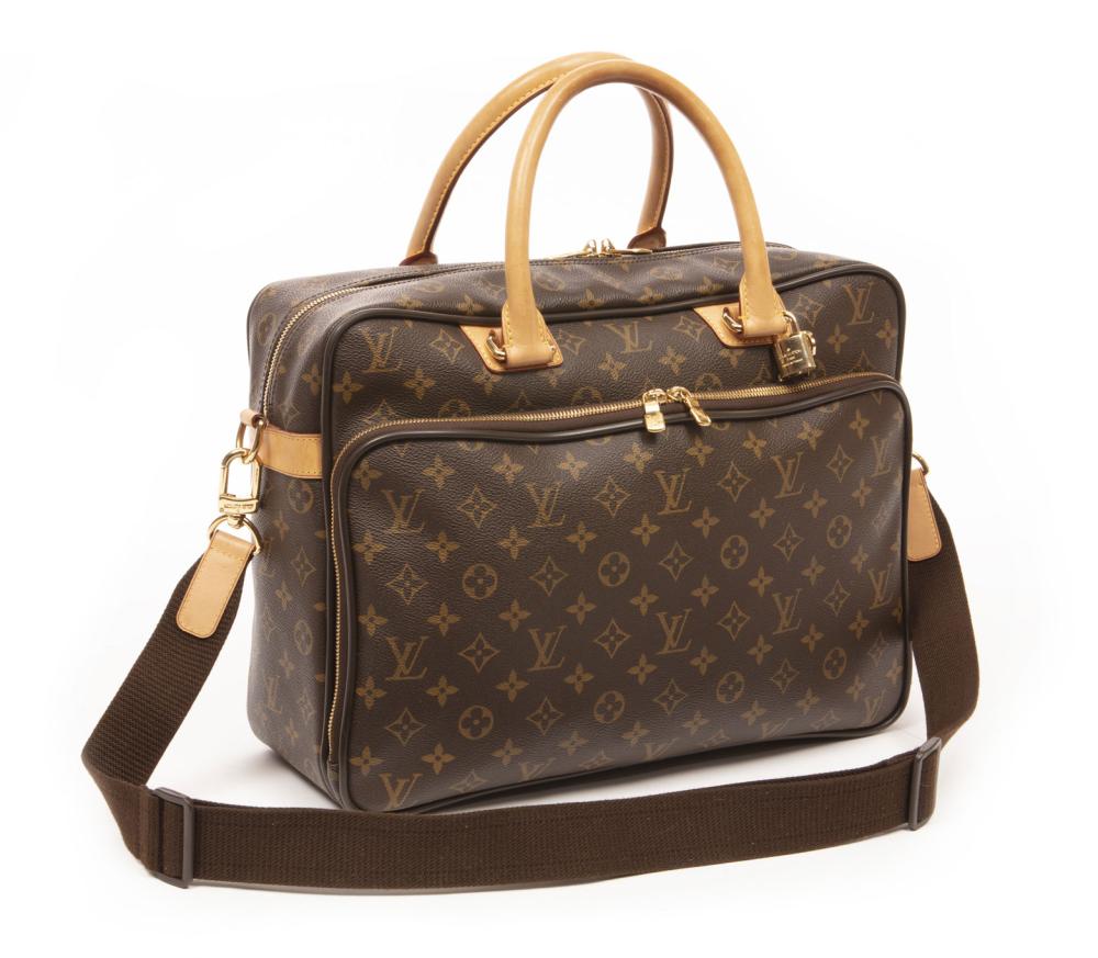 Appraisal: Louis Vuitton Monogram Canvas Travel Bag brown coated canvas gold-tone