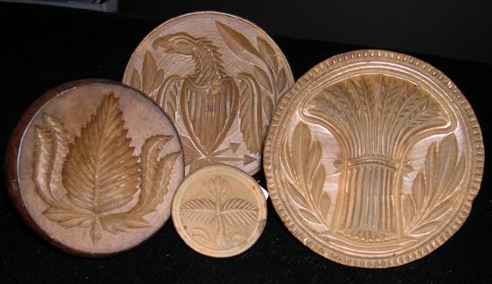 Appraisal: Four round wooden butter stamps the largest '' including a