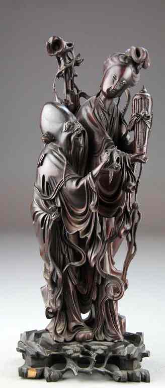 Appraisal: Chinese Qing Carved Rosewood Figural GroupingDepicting Shilo and Guan Yin