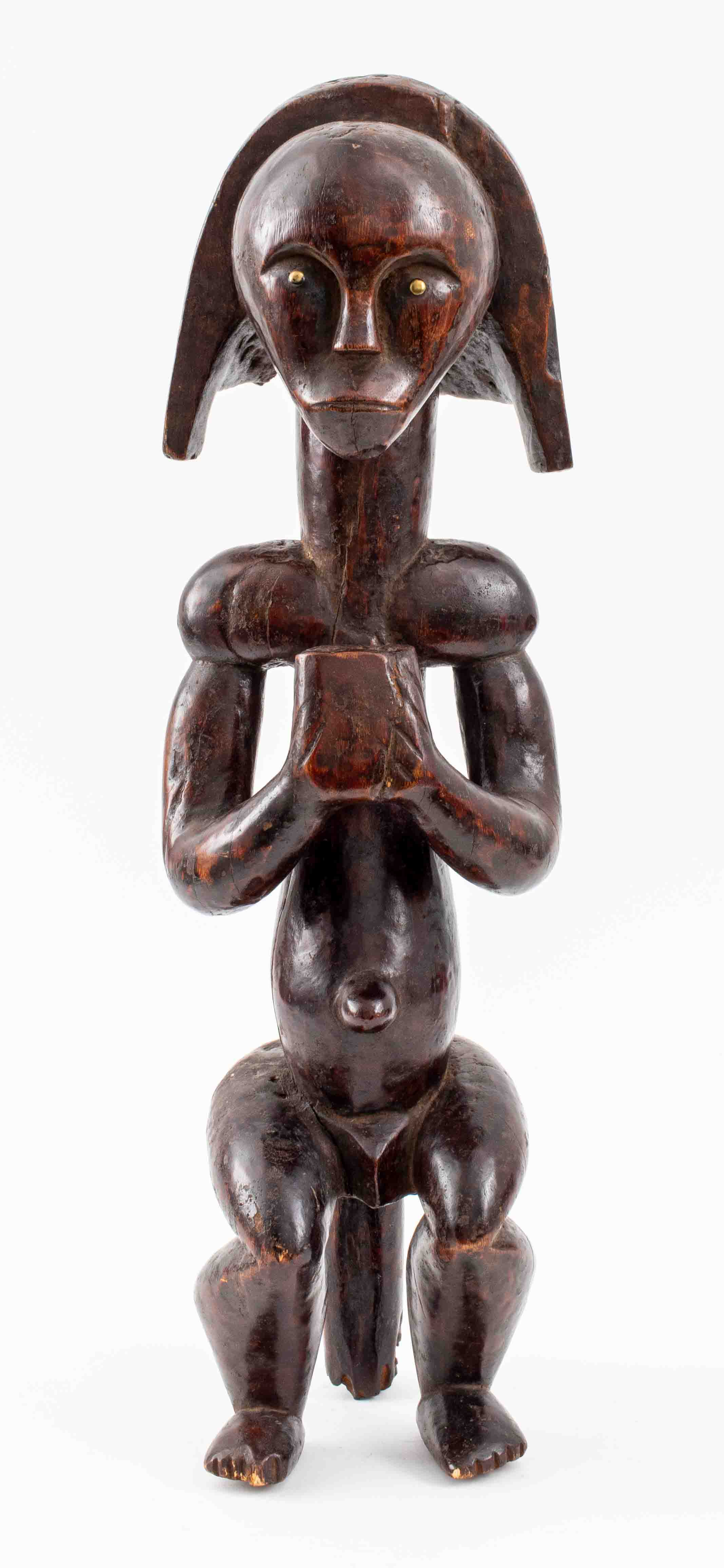 Appraisal: FANG CARVED WOODEN RELIQUARY GUARDIAN FIGURE African Fang people of