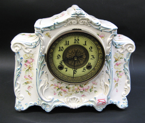 Appraisal: AMERICAN CHINA CLOCK having a floral decorated white china case