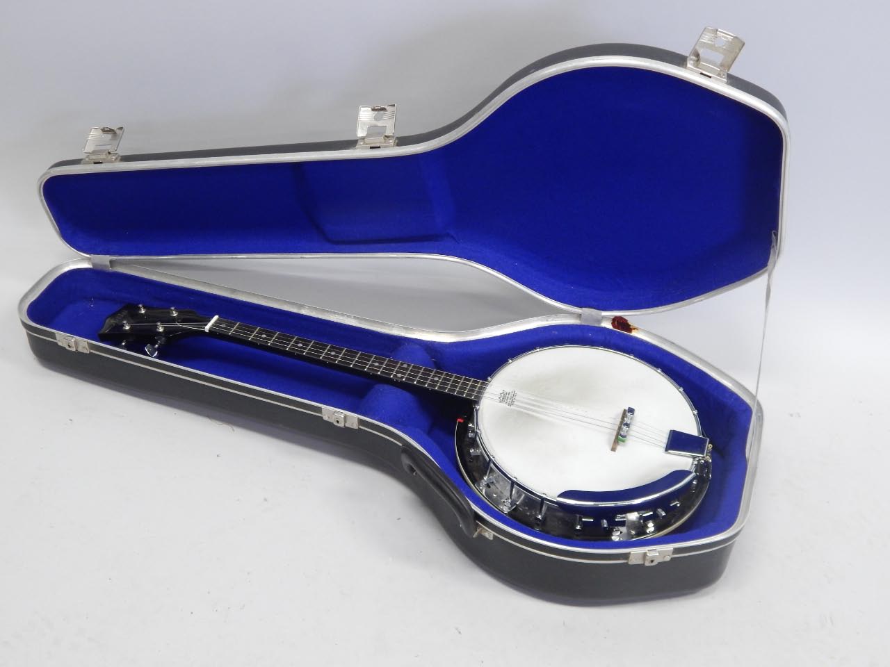 Appraisal: An Artist Banjo with chrome plated mounts ebony figure board