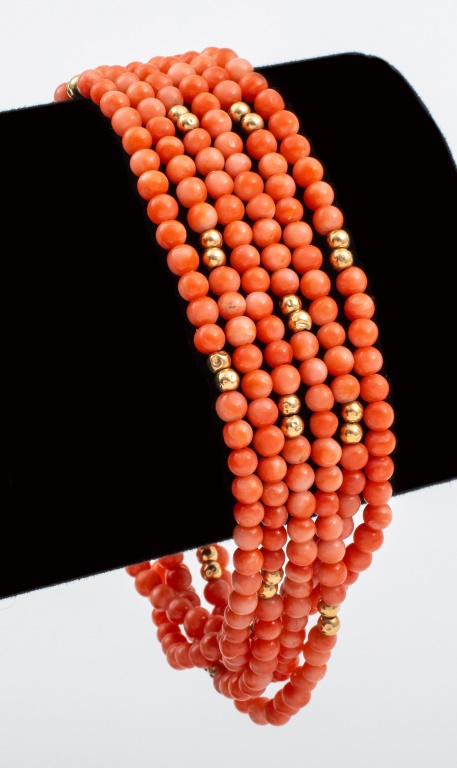 Appraisal: K GOLD CORAL MULTI-STRAND BEADED BRACELET Vintage k yellow gold