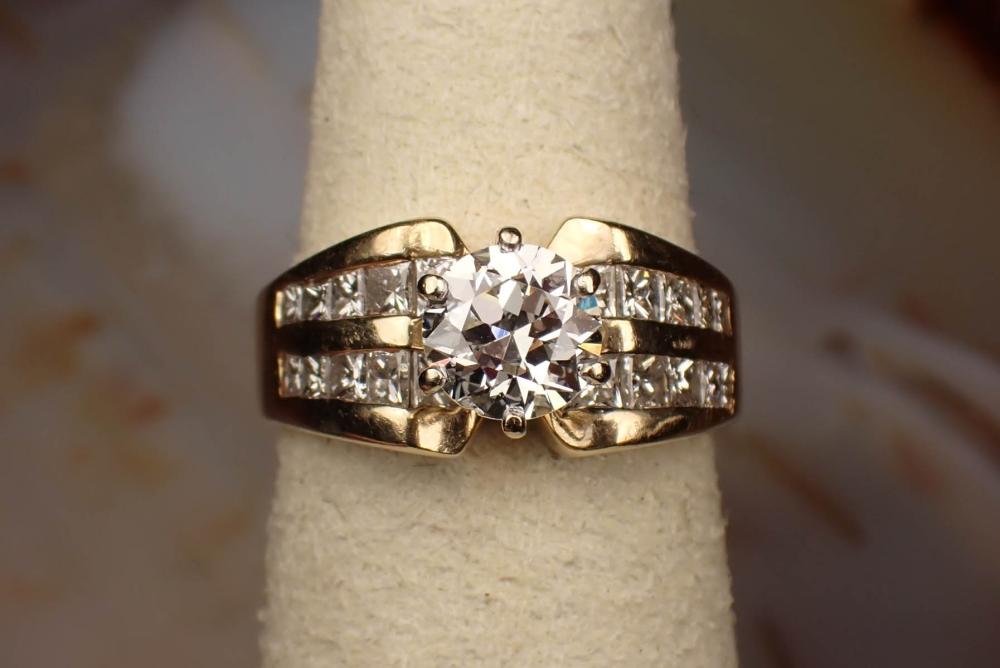 Appraisal: ESTATE DIAMOND AND FOURTEEN KARAT GOLD RING WITH APPRAISAL The