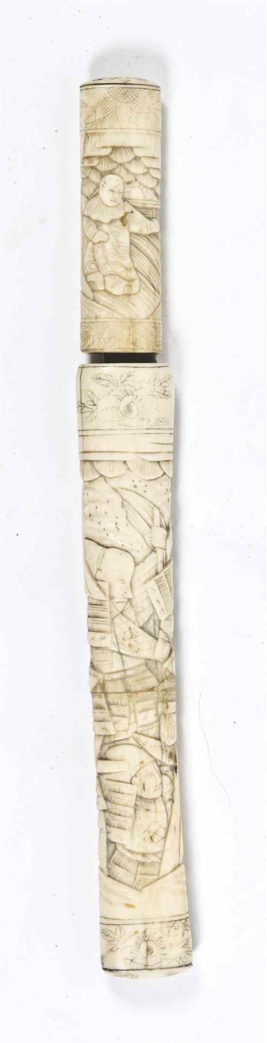 Appraisal: A Japanese Ivory Tanto of typical form having figural relief