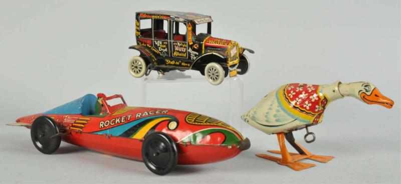 Appraisal: Lot of Tin Litho Wind-Up Toys Description American Working Includes