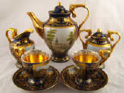 Appraisal: A ceramic coffee set comprising pot cream jug covered sugar