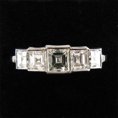 Appraisal: A diamond five stone ring the five graduated square cut