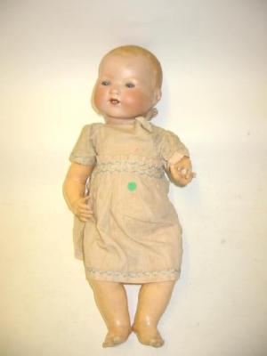 Appraisal: An Armand Marseille bisque head baby doll with blue glass