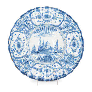 Appraisal: A Delft Style Blue and White Glazed Earthenware Charger th