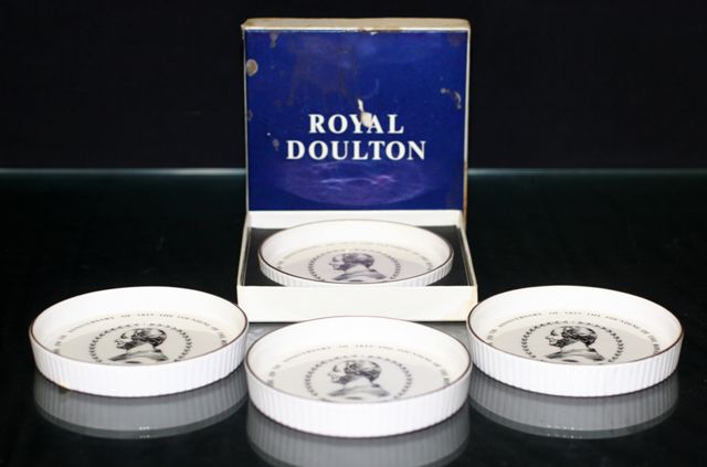 Appraisal: A set of four Royal Doulton pin trays commemorating the