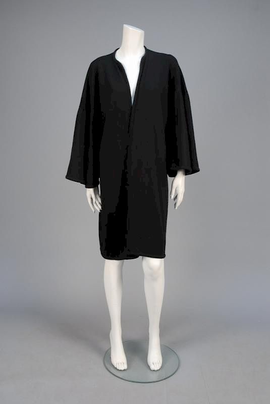 Appraisal: HALSTON CASHMERE SPRING WRAP LATE s Black lightweight knit coat