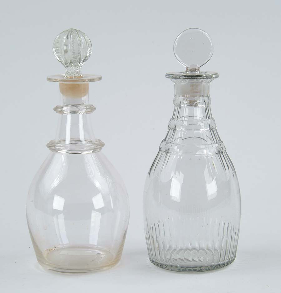 Appraisal: PAIR OF EARLY RING DECANTERS Cut bevel design and polished