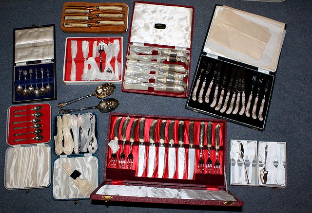 Appraisal: TEN VARIOUS BOXES of plated flatware and a pair of