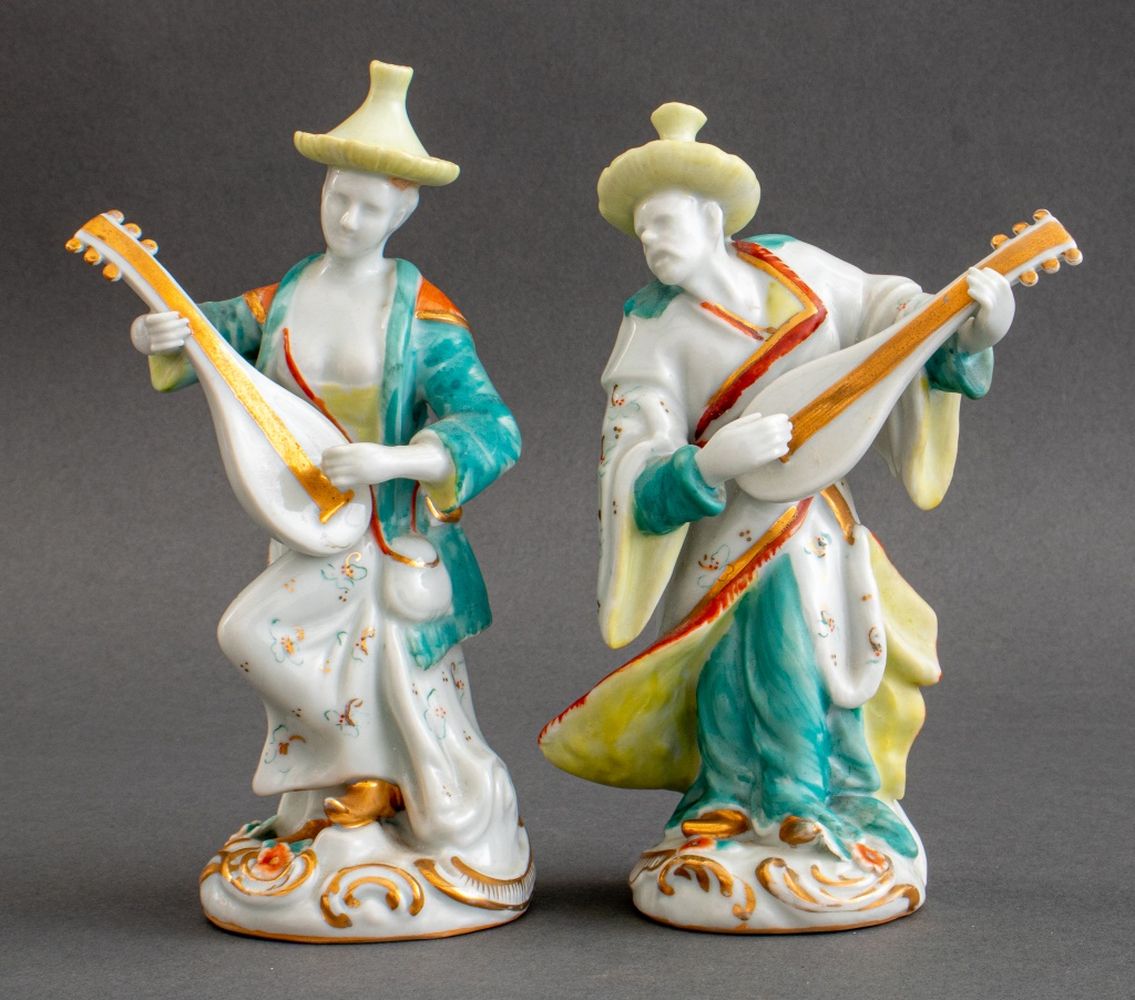 Appraisal: MID-CENTURY JAPANESE PORCELAIN FIGURINE PAIR Pair of Mid-Century Japanese hand