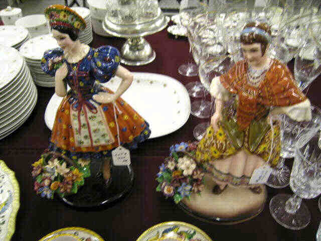 Appraisal: Pair of Italian Pottery Figurines of ladies with baskets of