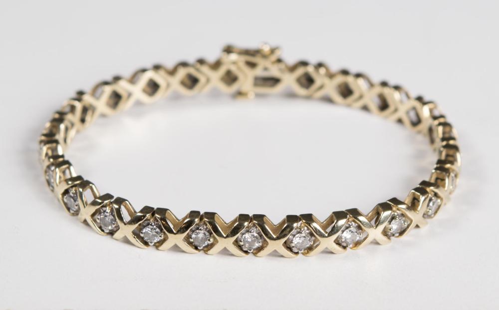 Appraisal: DIAMOND AND FOURTEEN KARAT GOLD TENNIS BRACELET The k yellow