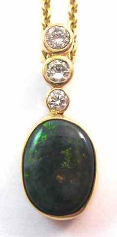 Appraisal: OPAL AND DIAMOND PENDANT NECKLACE the pendant is suspended on