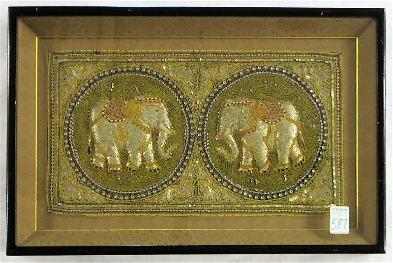 Appraisal: FRAMED INDIAN NEEDLEWORK TAPESTRY WITH ELEPHANTS sewn with silver metallic