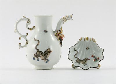 Appraisal: A Meissen coffee pot and a shell-shaped salt each painted