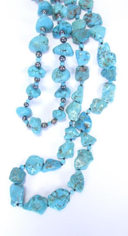 Appraisal: Two chunky tumbled turquoise necklaces one with silver bead accents