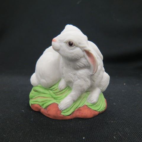 Appraisal: Boehm Porcelain Figurine Snuggling Rabbits excellent