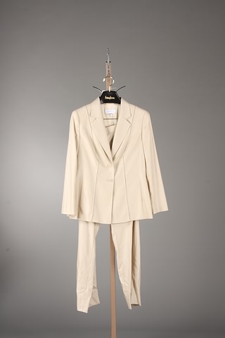 Appraisal: Escada creamy tan wool silk jacket with stitching and matching