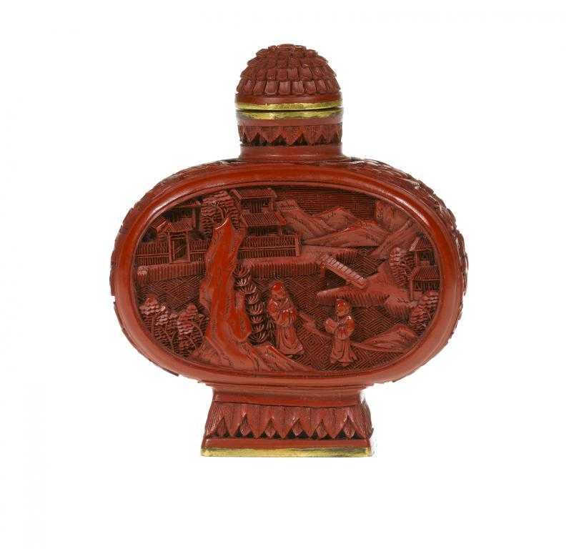 Appraisal: A CHINESE CINNABAR LACQUER SNUFF BOTTLE carved to both faces