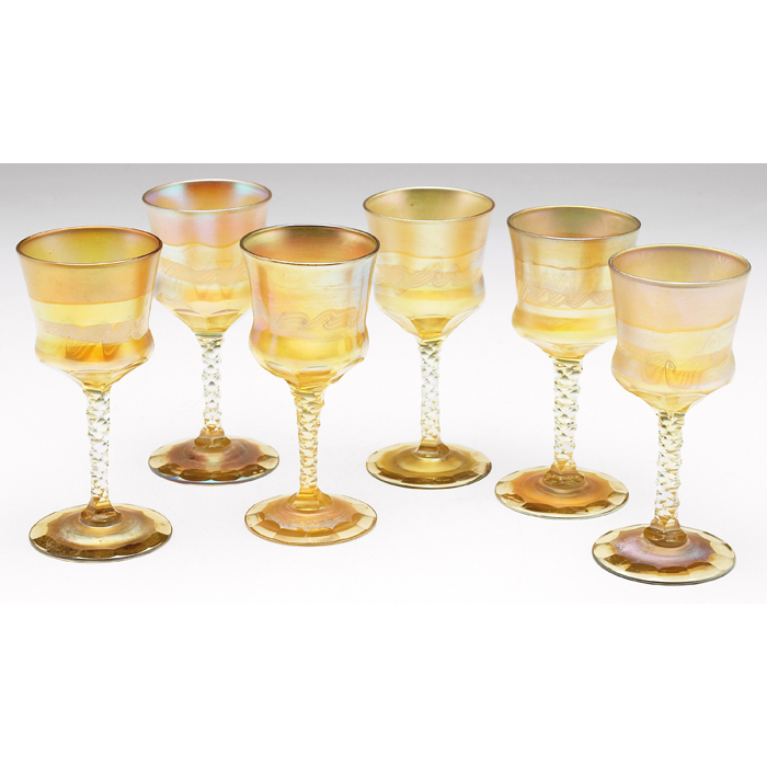 Appraisal: L C Tiffany glasses set of gold favrile glass with