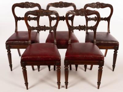 Appraisal: Five Regency rosewood dining chairs with carved backs and upholstered