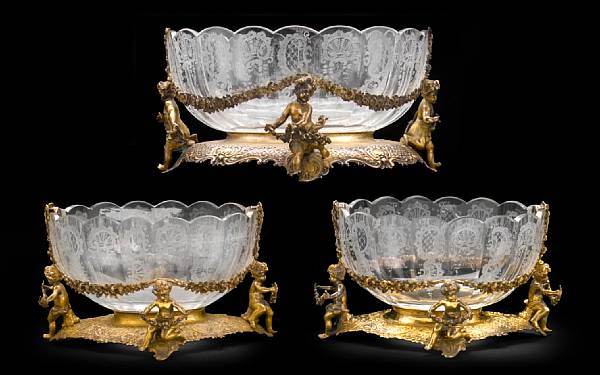 Appraisal: A Continental Rococo style garniture of three gilt metal and